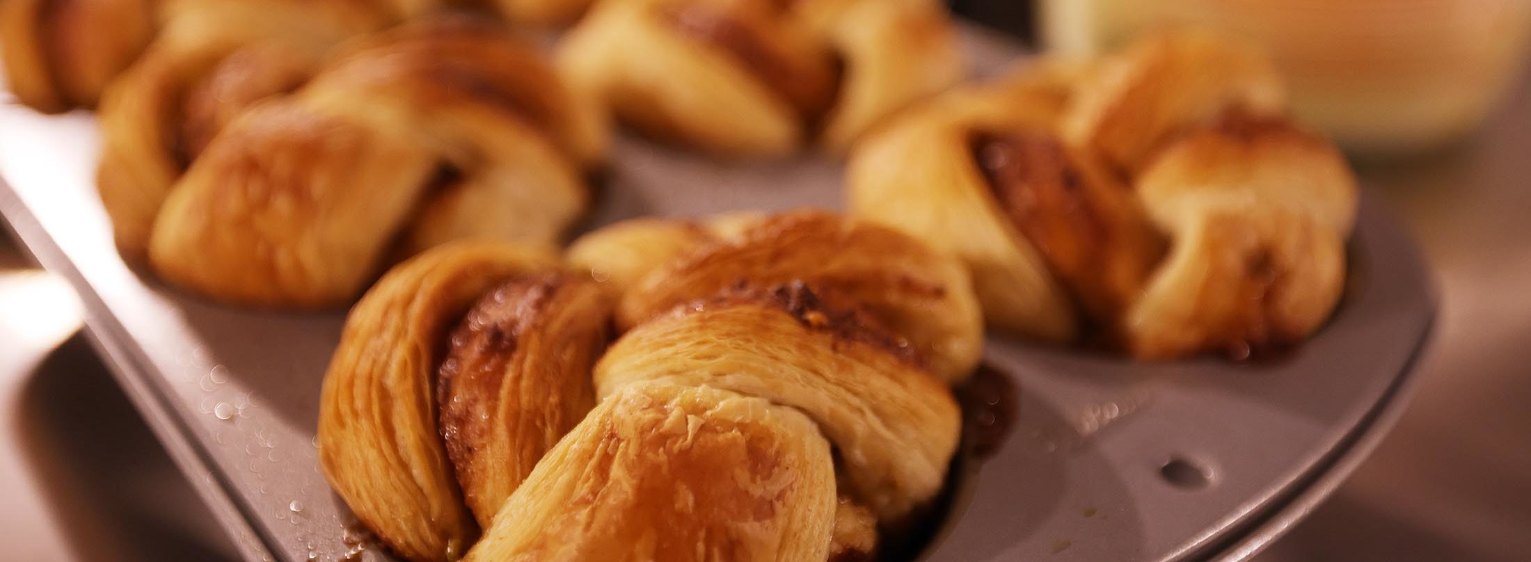 closeup of baked pastries in a muffin tin